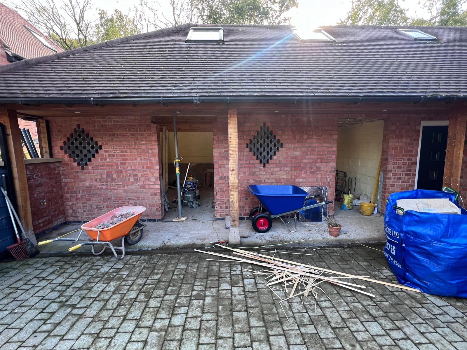 Before: bare block walls awaiting prep and skim